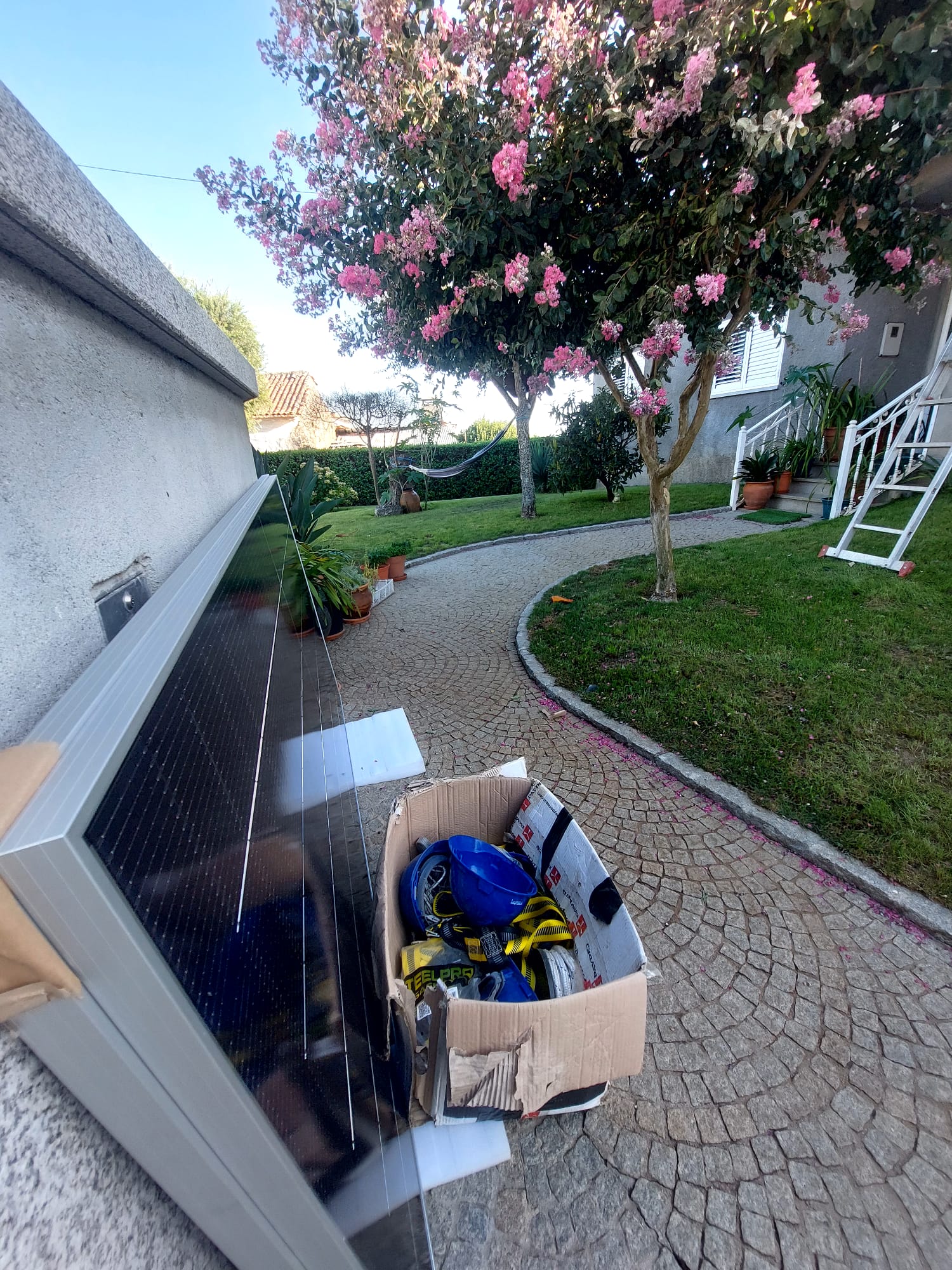 Panels on their way to the roof. Safety first!