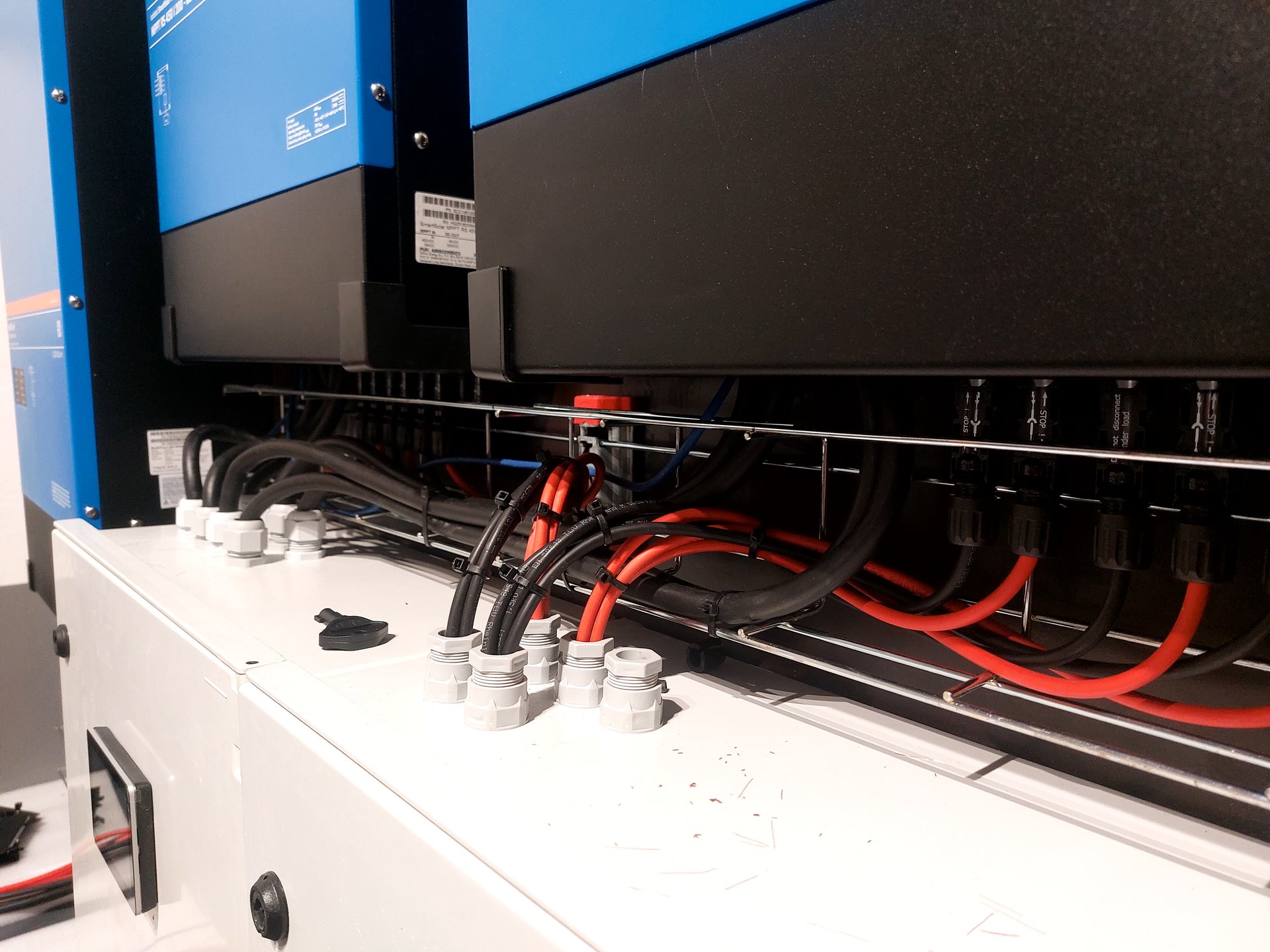 Cable glands and MC4 connections with the touch screen of the solar system just below