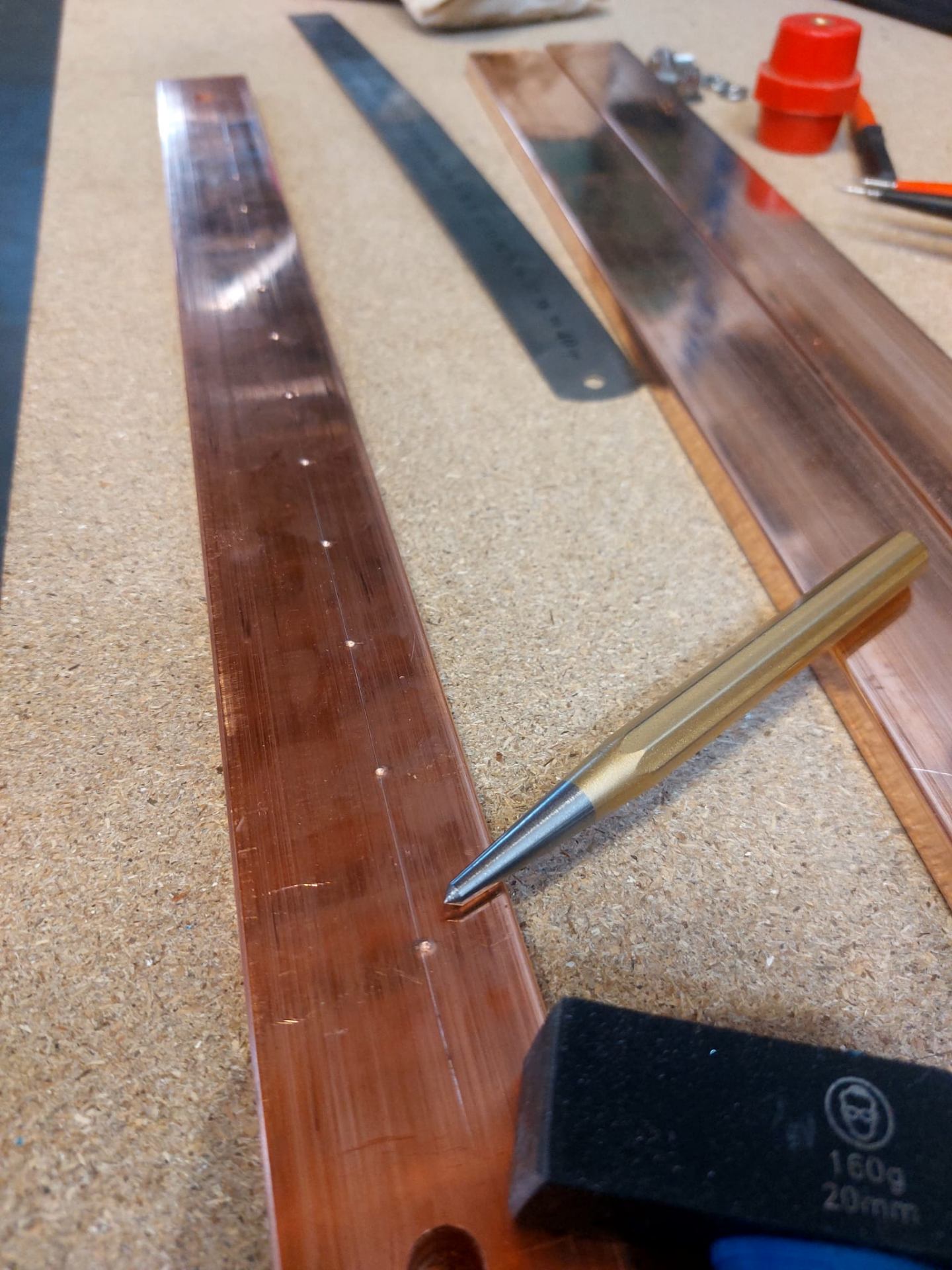 Marking out copper busbars on the bench